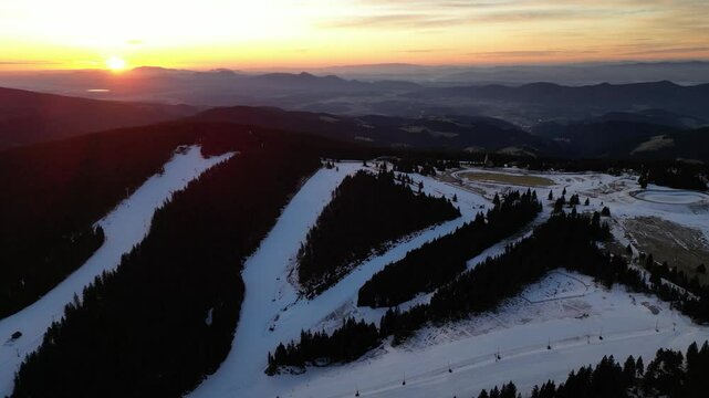 Aerial drone morning view of ski resort Rogla at sunrise dawn. Panoramic winter shot of Ski center Rogla, Slovenia