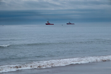 Cargo ships sailing on Atlantic ocean, north scotland