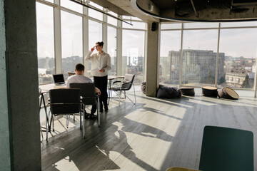 Two office workers working together 