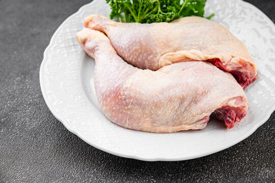 Chicken legs raw poultry meat tasty fresh delicious gourmet food background table rustic food top view copy space keto and paleo diet