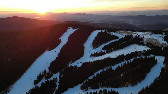 Aerial drone morning view of ski resort Rogla at sunrise dawn. Panoramic winter shot of Ski center Rogla, Slovenia
