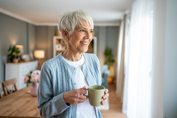 Senior woman enjoying a relaxing moment with coffee at home