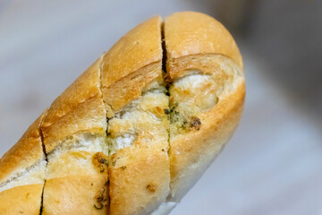 Freshly baked bread with a crispy crust, showcasing a classic design and a slight aroma, ideal for culinary presentations and food-related content