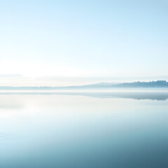 Fototapeta premium pastel serene landscape with fog rolling over a quiet lake at dawn, evoking a demure and contemplative atmosphere, minimal background with copy space