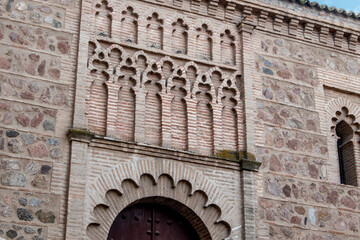 Obraz premium Mudejar style brick decoration on the façade of the church of Santa Leocadia in Toledo