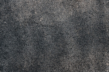 asphalt texture background. background of rough black asphalt surface with granular texture