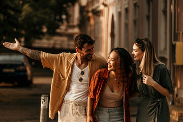 Young adults exploring the city, enjoying summer vibes and good company.