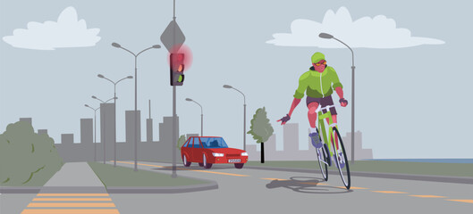 Urban Cyclist at Traffic Light Intersection