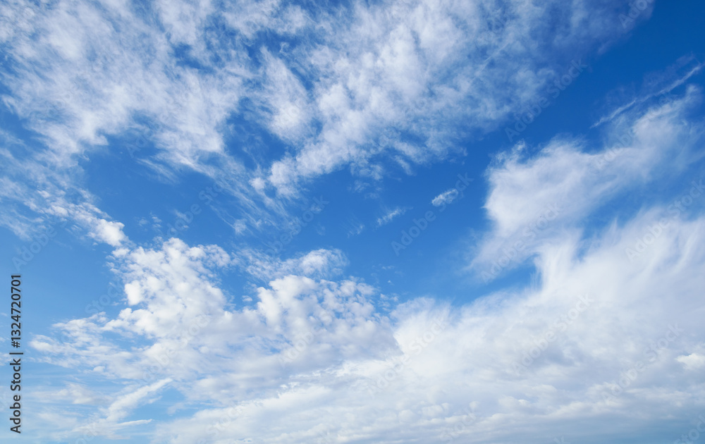 Wall mural beautiful blue sky with soft white clouds for abstract background