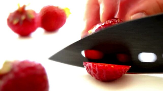 Cutting Strawberry - Red Berries on White