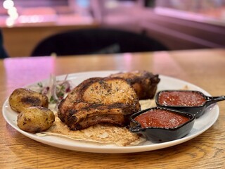 Enjoy Grilled Chicken with roasted Potatoes and flavorful Sauces for an unforgettable meal. Enjoy a flavorful grilled chicken dish with tasty potatoes and rich sauces for a delightful meal experience