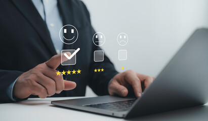 Businessman interacting with a digital customer review system, selecting a five-star rating to indicate high satisfaction. service quality and reputation management concepts