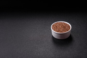 Flax seeds in a bowl, an ingredient for making vegan or vegetarian food