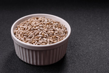 Peeled sunflower seeds in a bowl, an ingredient for making vegetarian food
