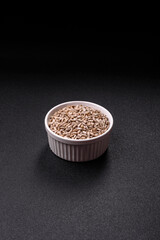 Peeled sunflower seeds in a bowl, an ingredient for making vegetarian food
