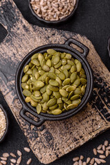 Peeled pumpkin seeds in a bowl, an ingredient for making vegetarian food