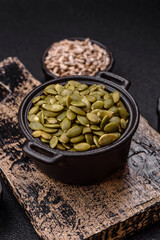 Peeled pumpkin seeds in a bowl, an ingredient for making vegetarian food