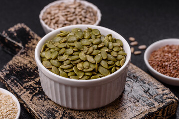 Peeled pumpkin seeds in a bowl, an ingredient for making vegetarian food
