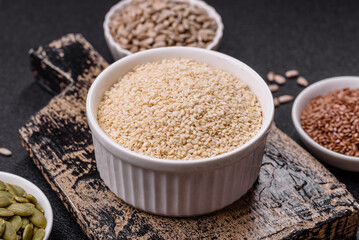 White sesame seeds in a bowl, an ingredient for making vegetarian food
