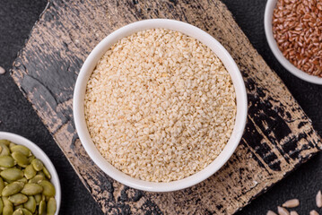 White sesame seeds in a bowl, an ingredient for making vegetarian food