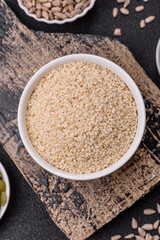 White sesame seeds in a bowl, an ingredient for making vegetarian food