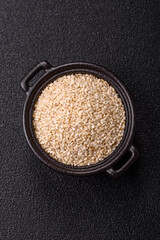 White sesame seeds in a bowl, an ingredient for making vegetarian food