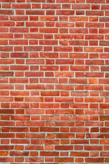 Red brick wall texture, perfect for background use, featuring uniform bricks and natural color variations