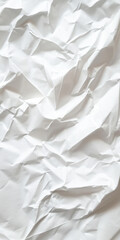 Obraz premium Crumpled white paper texture with creases and folds