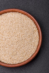 White sesame seeds in a bowl, an ingredient for making vegetarian food