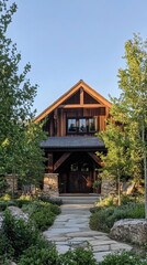 Fototapeta premium Rustic wooden cabin amidst lush greenery with stone pathway and clear blue sky