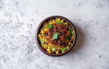 Fried onion lentil fried rice in a bowl, moujadara