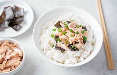 Rice bowl with salmon flakes, nori and scallion