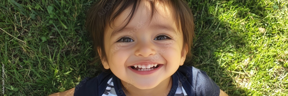 Poster smiling child enjoys a sunny day in the park surrounded by green grass