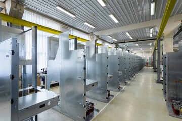 electrical cabinet housings, installation of components in production, assembly shop of metal electrical cabinets