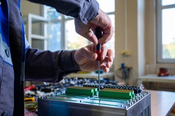 assembly of electrical cabinet components, installation of components in production, hands on site main plan