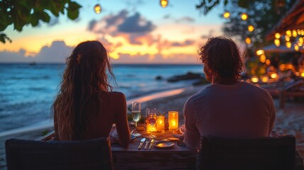 A couple enjoying a romantic dinner by the beach at a resort, with candlelight and ocean views