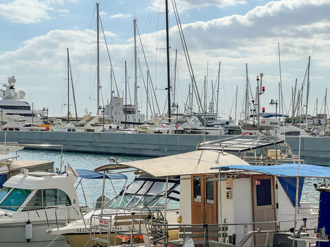 Limassol, Cyprus, October 18, 2024: The port quay in Limasol, Cyprus, with a large number of ships, ruba cutters and yacht
