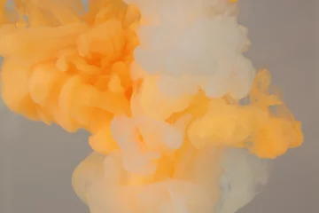 Fotobehang Abstract soft focus blur smoke background. Ink colors blot in water. Yellow, white, beige pastel neon tone. © Liliia