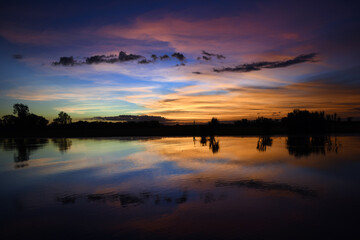 Obraz premium spectacularly and colorful sunset at Yellow Waters Billabong, Kakadu National Park, Northern Territory, Australia 