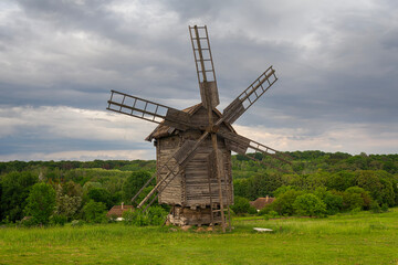 Traditional ukrainian windmill in the museum of national architecture in Pirogovo. Kyiv, Ukraine