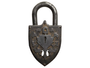 Detailed view of an antique ornate padlock with a shield-shaped design and visible rust