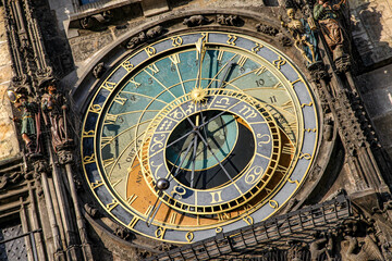 A Prague Town Hall Clock tower with two clocks on it