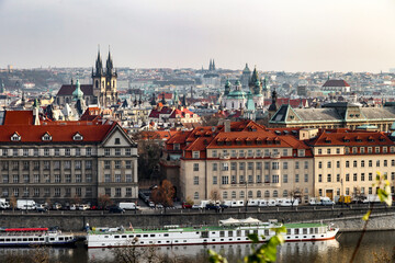 Fototapeta premium A city Prague in Czech Republic view with a tall building in the background