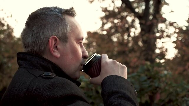 Man waiting for work colleagues at business meeting drinking coffee. Business meeting of colleagues and man drinking coffee. Business meeting with colleagues to discuss plan from man drinking coffee