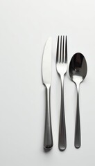 Elegant silverware set on pristine white background, restaurant, meal