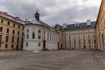 Fototapeta premium Holy Cross Chapel and old provincial house during winter in Prague Castle