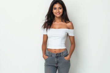 Half-Length (Waist-Up) portrait of young stylish smiling Indian female model in emo wear isolated on pure white background looking at camera