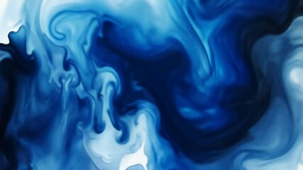 Mesmerizing blue ink flow creating hypnotic abstract patterns in liquid motion