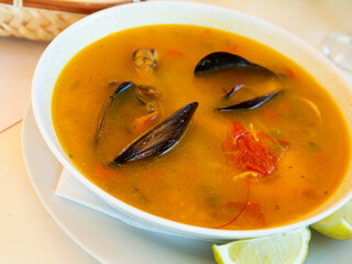 Spicy seafood soup with king prawns; shellfish and octopus. High quality photo