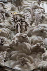 Obraz premium A detailed view of the Plague Column in Vienna, showcasing its intricate sculptural elements.